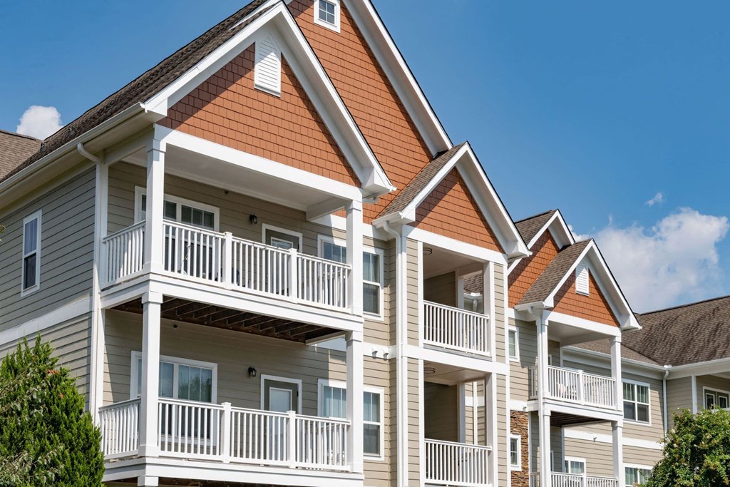 Bright Apartment Home Exteriors with Trees Inviting You Inside at Ashby at Ross Bridge, Hoover, AL 35226