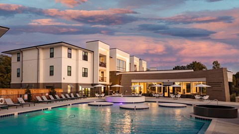a large swimming pool in front of a hotel a large swimming pool in front of a hotel at Esplanade District Apartments, Arkansas