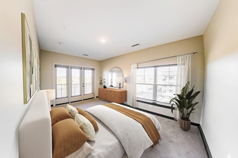 A bedroom with a large bed and a window overlooking a balcony.