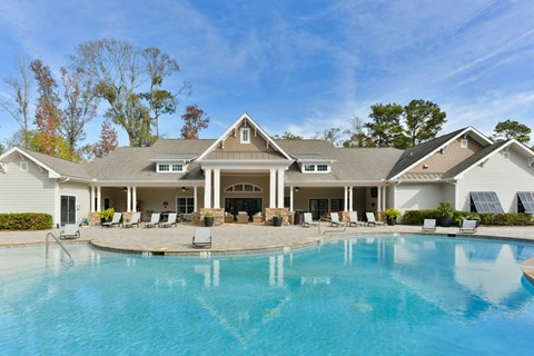 a large swimming pool in front of a house at Legends at Chatham, Georgia