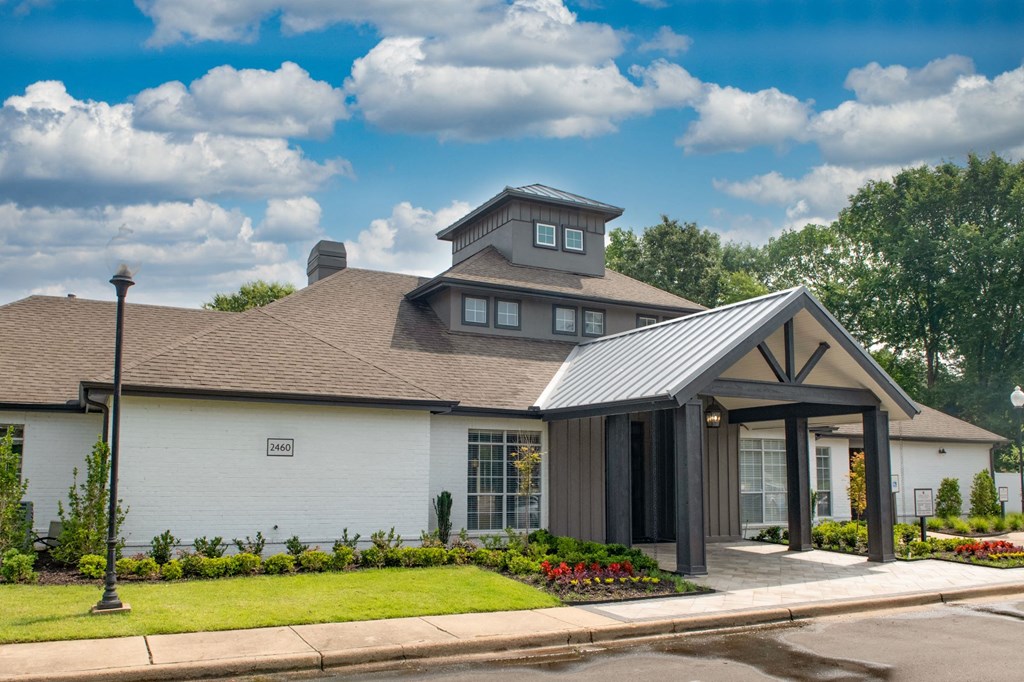 a white house with a brown roof at Lincoln at Wolfchase, Cordova, TN