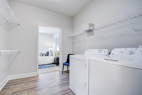 A laundry room with a washer and dryer.