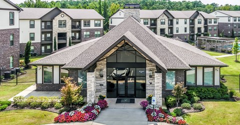 the front of a building with apartments in the background at The McKenzie Park Apartments, Arkansas