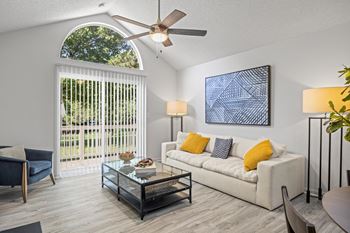 Living Room With Ceiling Fan at Pointe Royal, Overland Park, Kansas