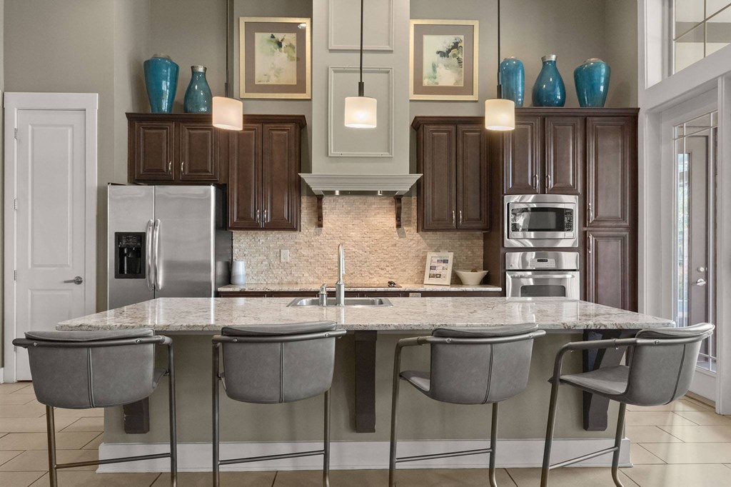 a kitchen with a marble counter top at The Ridge at Chenal Valley, Little Rock, AR 72223