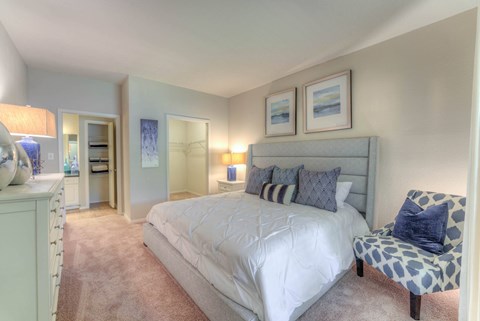Bedroom with a large bed at The Vineyards Apartments, Germantown, TN