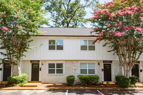 Apartment Exterior with Trees, Bushes and Walkway  at The Garden District Apartments, Tennessee , 38138
