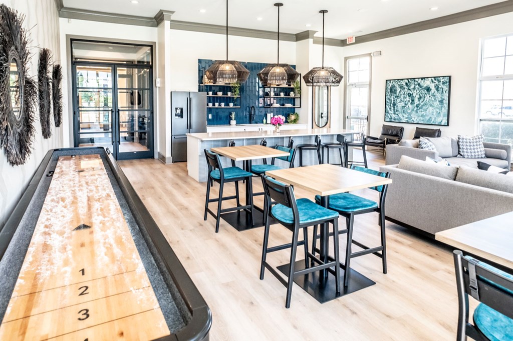 Clubhouse with Shuffleboard Table at Grand Island Apartments, Memphis, TN