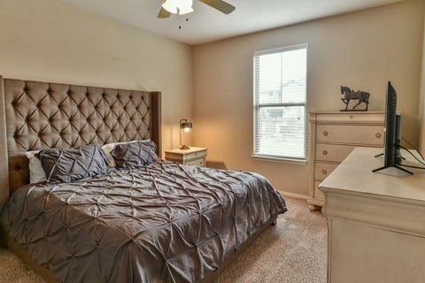 Bedroom with Ceiling Fan located at Hall Creek Apts in Arlington, TN 38002