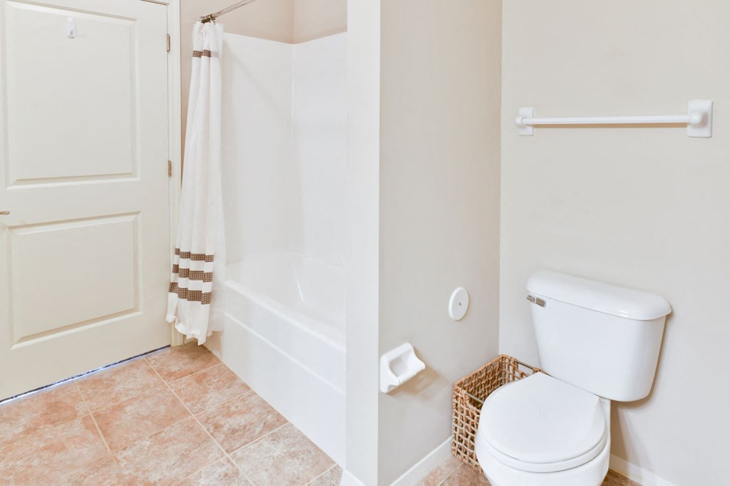 Bathroom with tub at Hall Creek Apts in