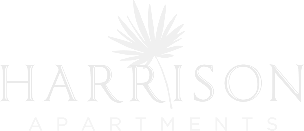 The image is a logo for Harrison Apartments.