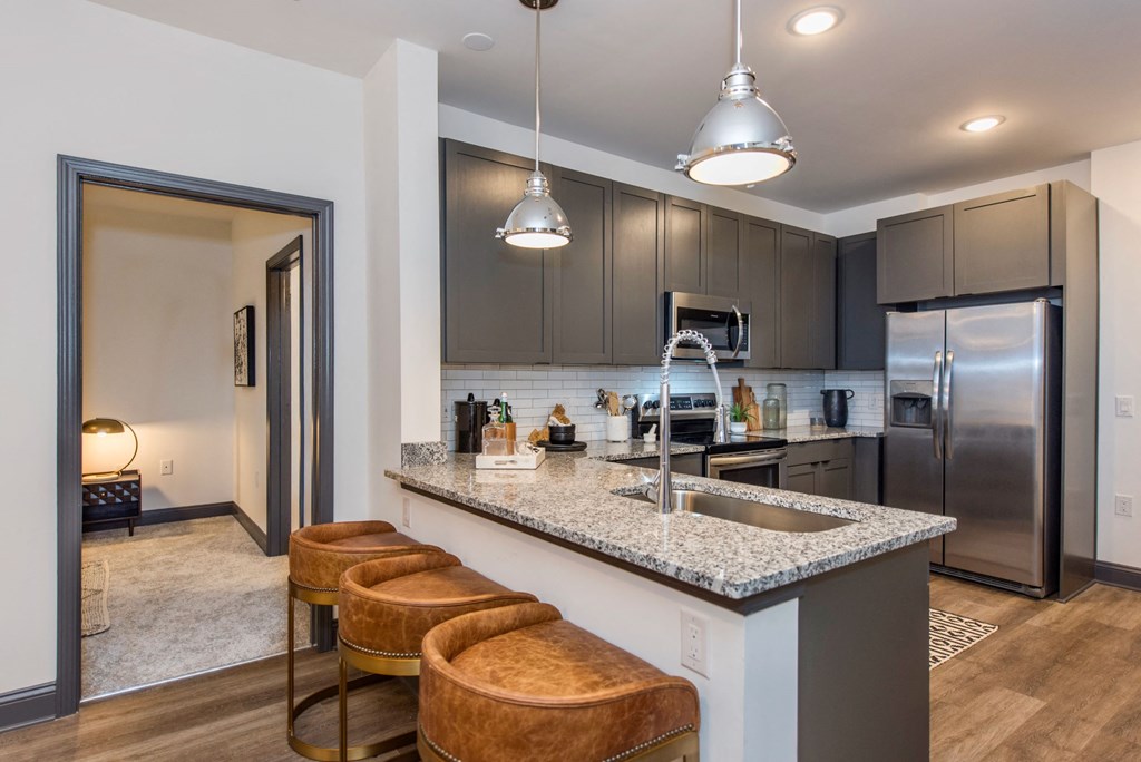 Model dining and living room at The Jamestown Apartment Flats, Virginia