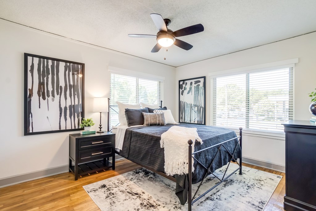 a bedroom with wood floors a bedroom with wood floors at Kiwi Goji Apartments, Memphis