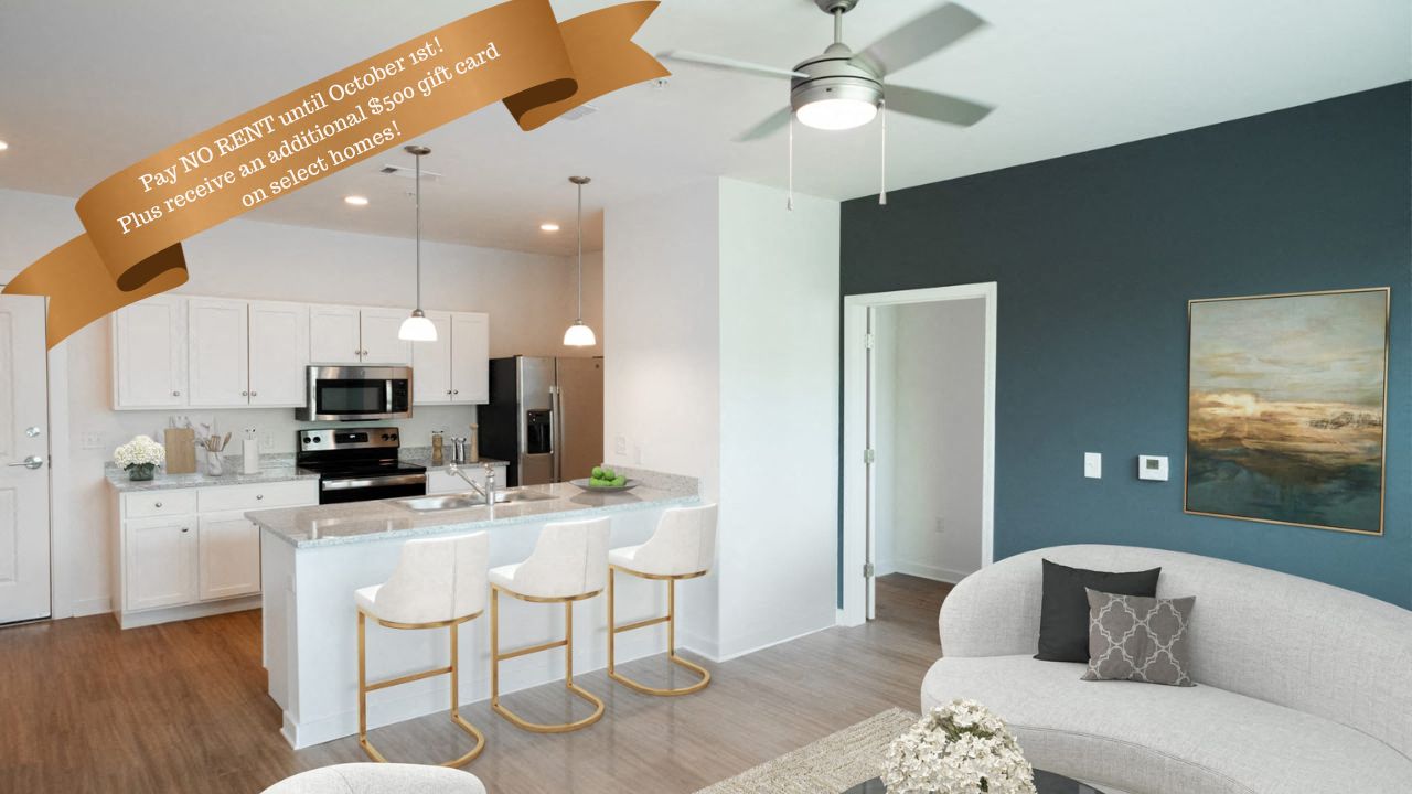 an open floor plan with a kitchen and living room