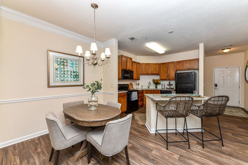 Dining room and kitchen Dining room and kitchen at Legends at Charleston Park Apartments, North Charleston, SC, 29420C 29420 - Photo Gallery
