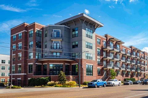 A large brick building with a sign that says