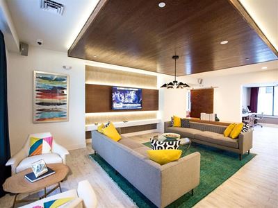 Large Clubhouse With Ample Sitting And Television at The Dartmouth North Hills Apartments, Raleigh, 27609