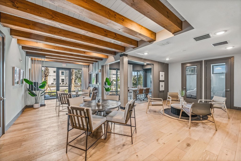 a living room filled with furniture and a large window at Livano Nature Coast, Spring Hill, 34608