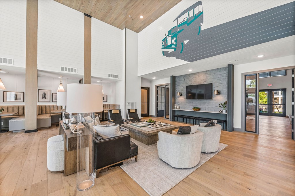 a living room filled with furniture and a large fireplace at Livano Nature Coast, Spring Hill, FL