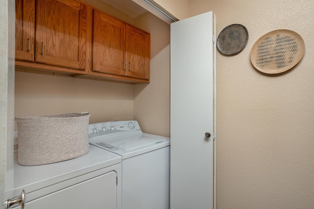 Model laundry room at Pointe Royal, Overland Park, Kansas