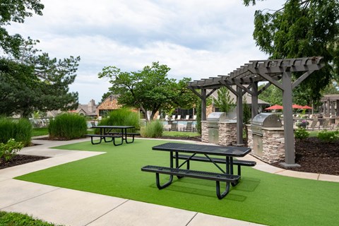 Enjoy our grilling area and picnic tables at Pointe Royal in Overland Park, KS