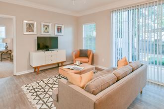 Spacious Living Room with Patio at Polos at Hudson Corners Apartments, South Carolina 29650