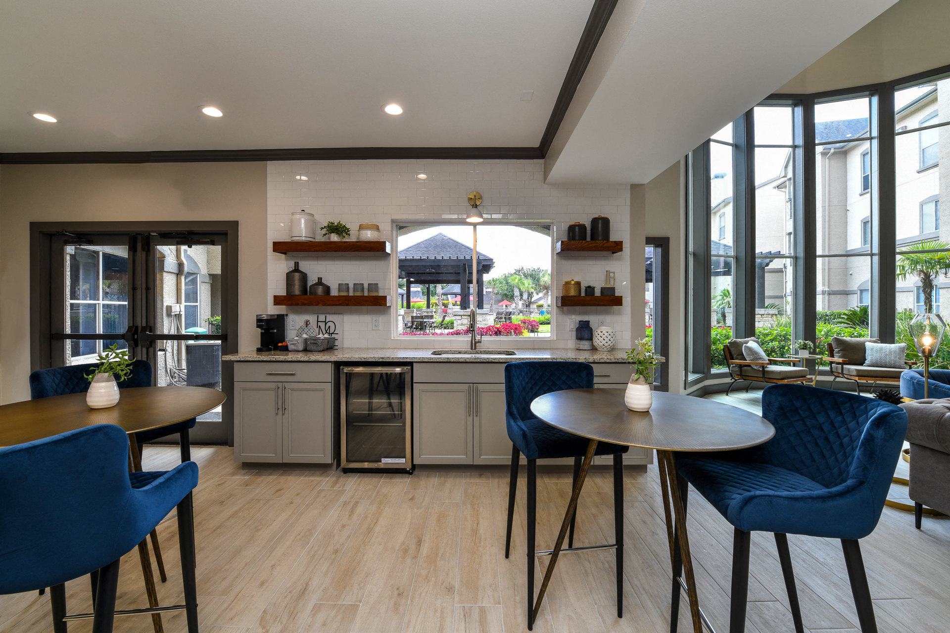 Clubhouse gathering area and kitchenette at The Retreat at Steeplechase, Houston, TX