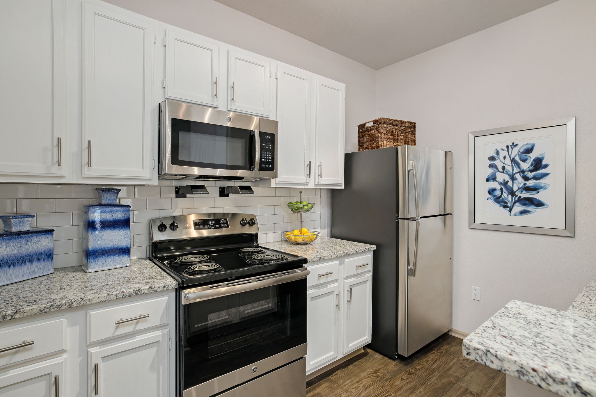 View of kitchen with appliances at Sandstone Creek Apartments , Overland Park, KS