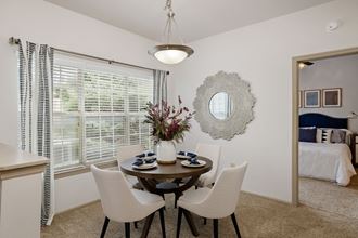 Dining table chair at Sandstone Creek Apartments , Overland Park, KS - Photo Gallery 2