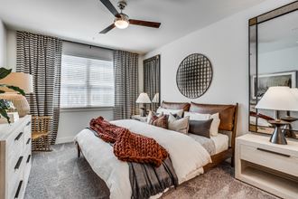 Secondary bedroom at Station at Old Town Apartments in Lewisville, TX 75075