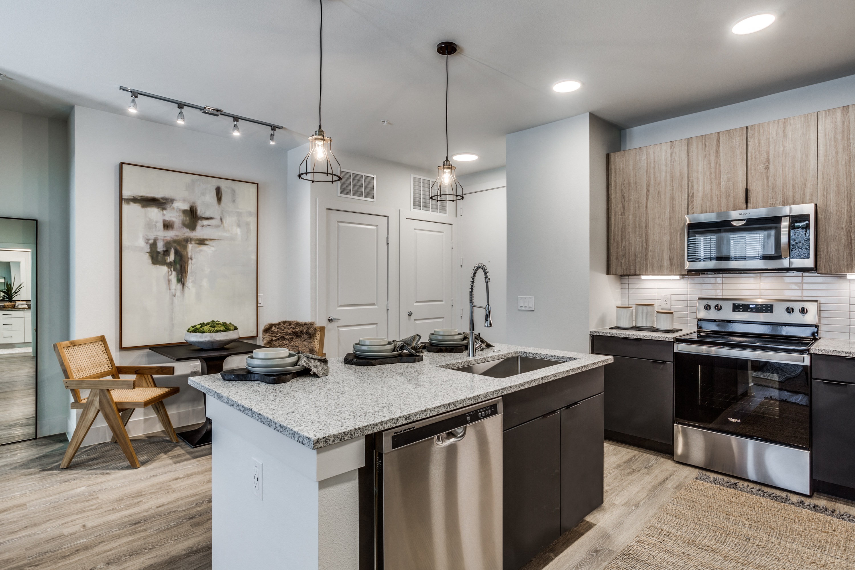 Model kitchen at Station at Old Town Apartments in Lewisville, TX 75075