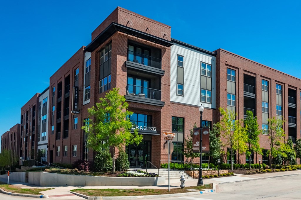 exterior shot of leasing office and apartments