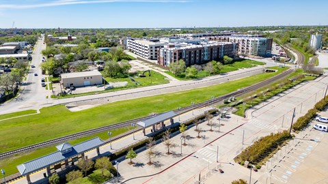 an aerial view of a city with buildings at Station at Old Town, Lewisville