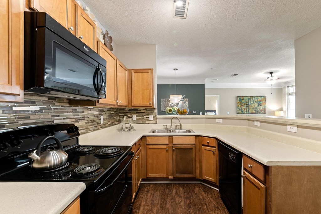 Model kitchen at  Sugarloaf Crossing Apartments, Lawrenceville GA 30046