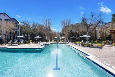 A large outdoor swimming pool at The Ambrose, Texas, 77040