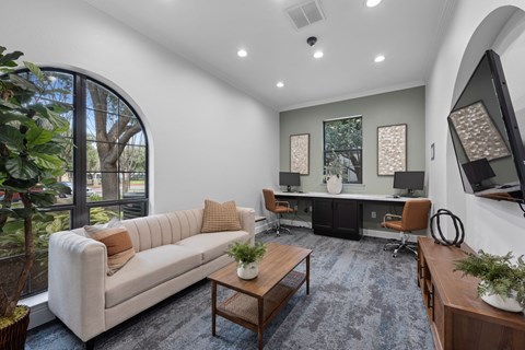 Clubroom With TV at The Ambrose, Houston