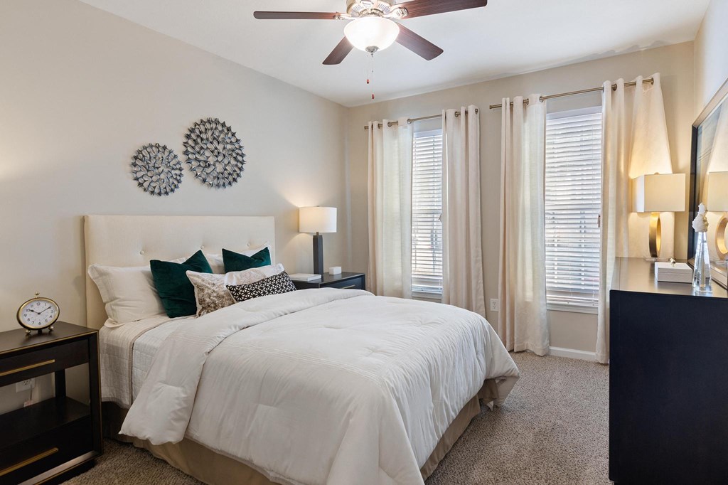 Master bedroom with bed at The Berkeley Apartments, Georgia, 30096