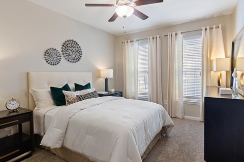 Master bedroom with bed at The Berkeley Apartments, Georgia, 30096