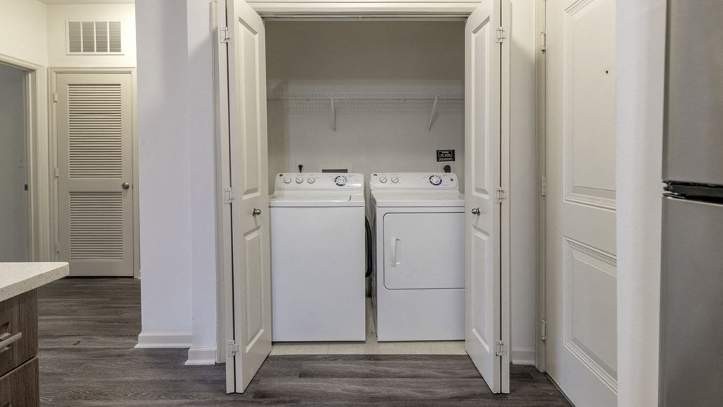 The Hendrix Apartments in Atlanta a laundry room with a washer and a dryer at The Hendrix, Georgia, 30329