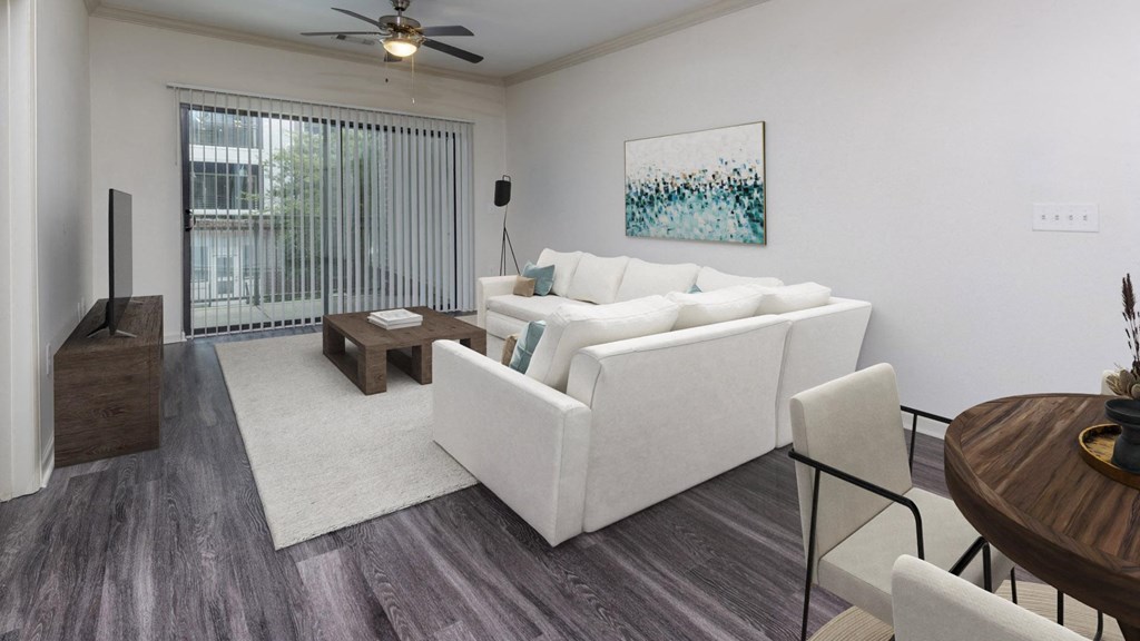 The Hendrix Apartments a living room with a white couch and a table at The Hendrix, Georgia