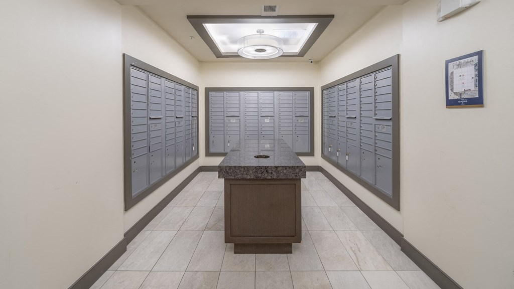 a room with lockers and a table in the middle at The Hendrix, Atlanta