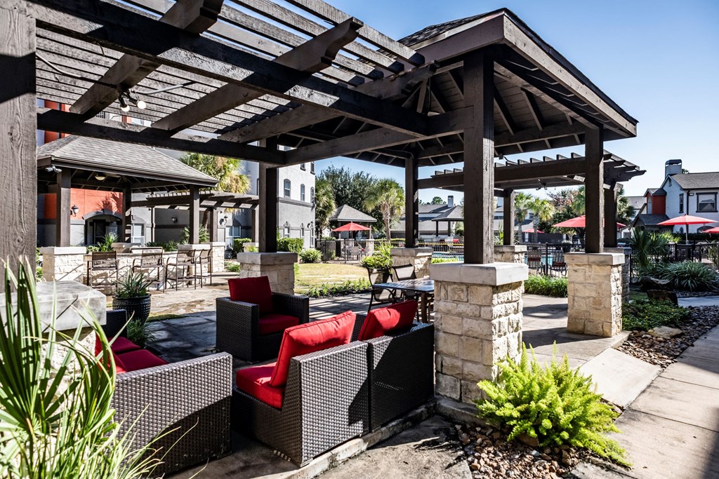 Seating Area at Pool  located at Retreat at Steeplechase in Houston, TX 77065