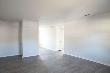 Venue at Carrolton Living Room with LVT flooring located in Carrolton, GA 30117