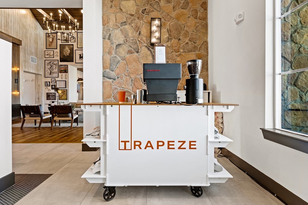 a coffee cart with the word trapeze in the lobby of a coffee shop