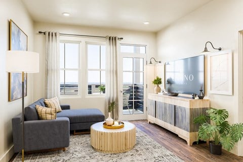 a living room with a couch and a coffee table at Livano Trinity Apartments, Nashville, 37207