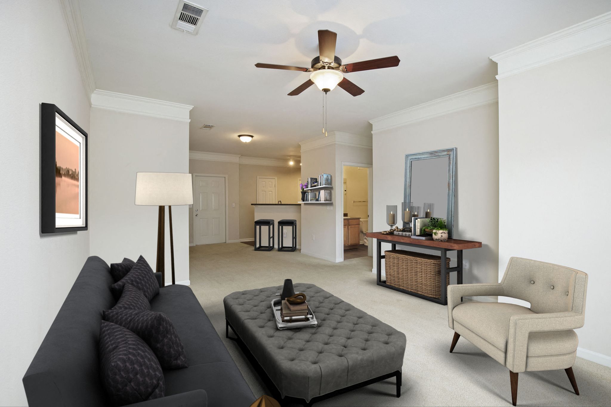 Living Room With Kitchen View at Villas at Carrington Square in Overland Park, KS