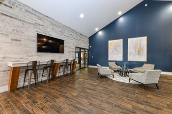 Sofa in Living Room with TV at Waterford Place, Louisville