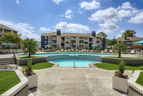 Resort style pool with elevated spa and palm trees at Wood Terrace Apartments, Georgia, 30340