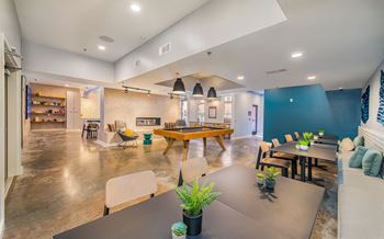 Resident lounge with billiards at The Baxly Apartments in Savannah GA 31401
