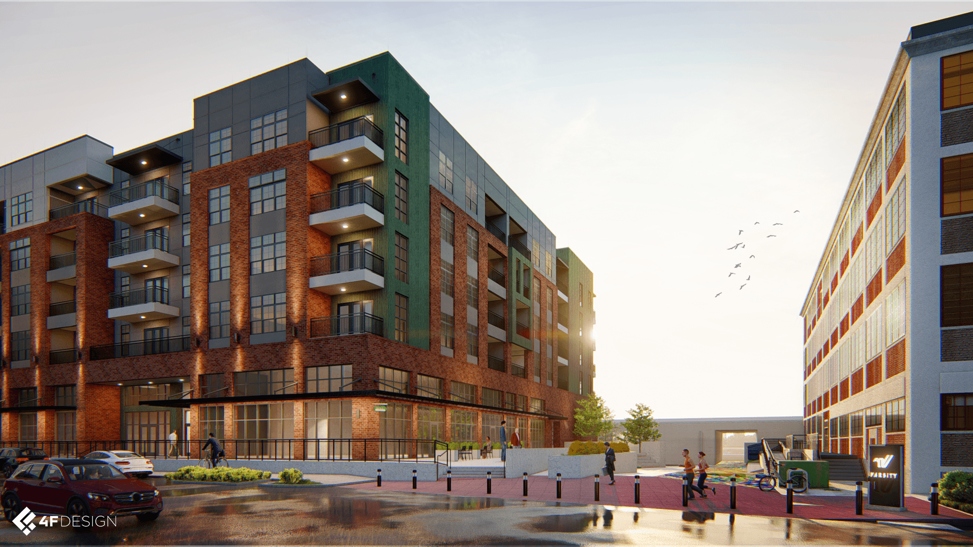 A modern apartment building with a parking lot in front.